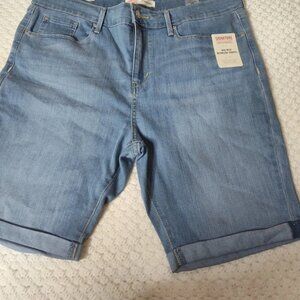 Levi's Signature Women's Mid Rise Bermuda Jean Shorts in a light wash denim.